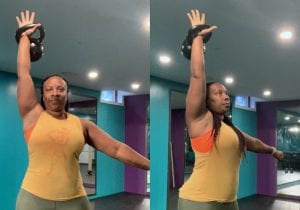 Damali demonstrating the overhead lockout position
