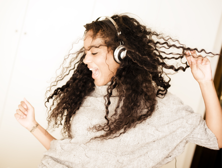 hierarchy-woman-dancing-headphones-450x340